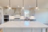kitchen with island and pendant lighting