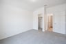 guest bedroom with carpet