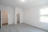 guest bedroom with carpet