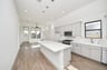 light colored cabinets and pendant lights