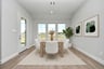 rendered photo of dining area with windows and access to backyard