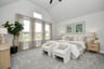 rendered photo of primary bedroom with tall ceilings and carpet