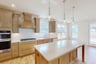 kitchen with an island and pendant lighting