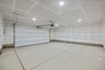 interior of spacious two-car garage with recessed ceiling lights