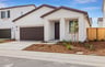 front exterior of white & brown single-story home with covered porch
