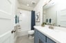 guest bathroom with tub