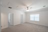 game room with carpet and ceiling fan 