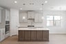 kitchen with large island and white countertops 