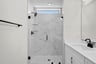 primary shower with a window