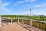 deck with a view of trees