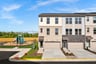 three-story townhome exterior with a garage