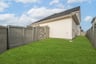 backyard with grass and covered patio