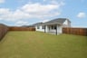 backyard with grass and covered patio