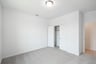 guest bedroom with carpet