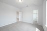 guest bedroom with carpet