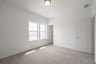 guest bedroom with carpet