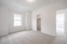 guest bedroom with carpet