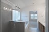 primary bathroom with soaking tub and walk-in shower