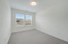 secondary bedroom with two windows
