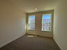 secondary bedroom with carpet