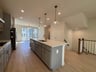 kitchen with a large island and a pantry