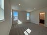 primary bedroom with access to the bathroom
