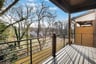 covered back deck with view
