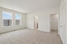 primary bedroom with two windows