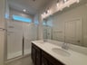 primary bathroom with an oversized shower