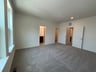 primary bedroom with carpet