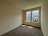 secondary bedroom with carpet