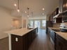 kitchen with brown cabinets