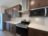 kitchen with brown cabinets