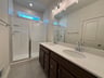 primary bathroom with an oversized shower