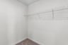 primary walk-in closet with wire shelving