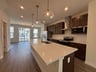 kitchen with view of dining area