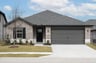 exterior of home with brick and stone