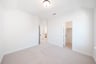 bedroom with carpet and closet 
