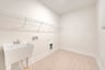 laundry room with a free-standing sink