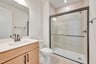 first floor bathroom with a walk-in shower