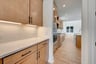 butler's pantry with access to the kitchen