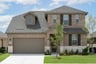 two-story home with brick and stone exterior