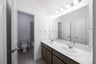 bathroom with two sinks and white countertops 