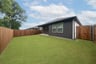 backyard with grass and covered patio