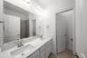 bathroom with two sinks and white countertops 