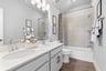 guest bathroom with soaking tub