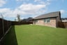 backyard with grass and covered patio