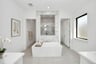 primary bathroom with soaking tub and shower
