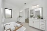 primary bathroom with separate vanities
