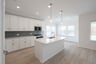 kitchen with white cabinets and countertops 